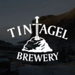 Tintagel brewery logo which is a black background with King Arthur's sword sticking out the stone