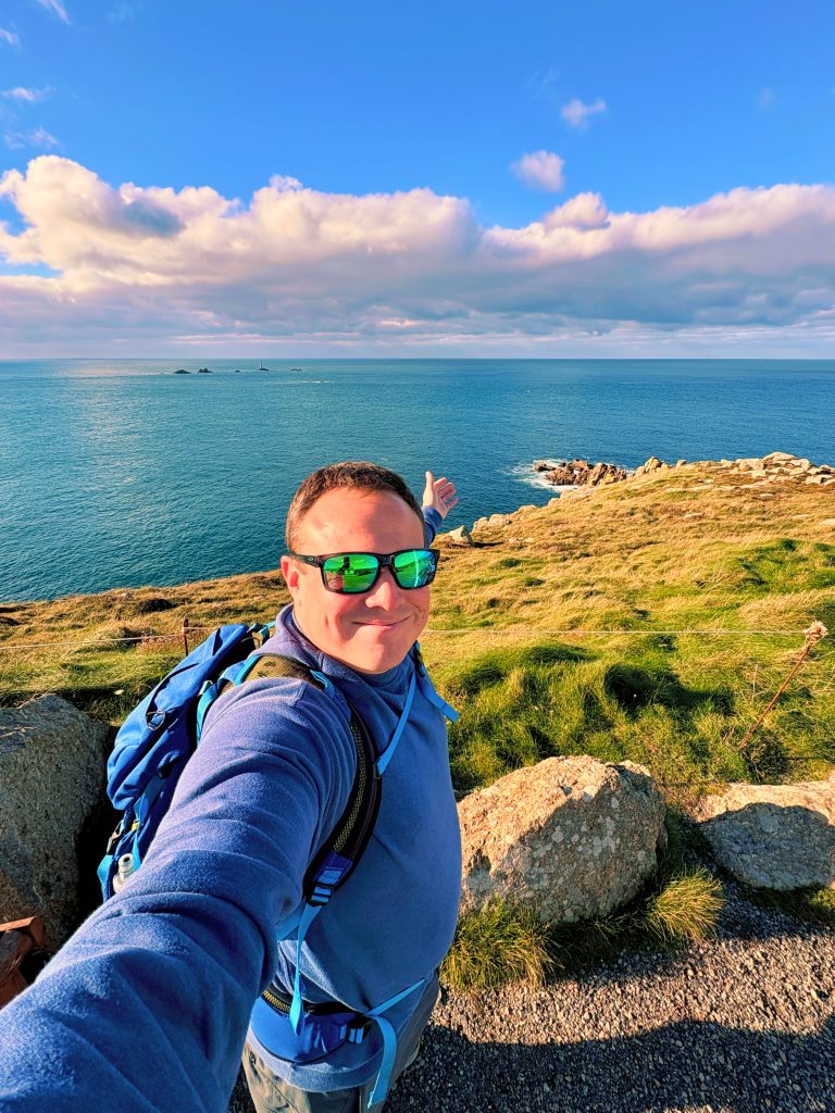Selfie on the South West Coast Path overlooking the sea, part of the Top 5 Cornwall walks by Bimbling Books and Beer